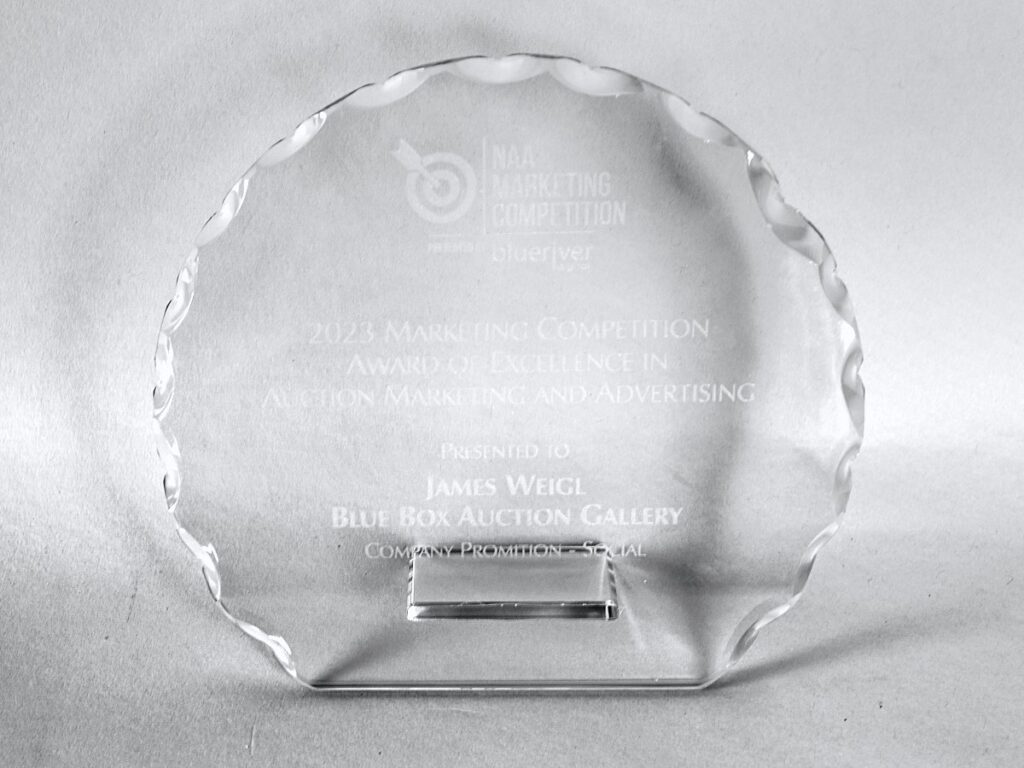 Round crystal award engraved: NAA Marketing Competition, 2023 Marketing Competition Award of Excellence in Auction Marketing and Advertising, presented to James Weigl, Blue Box Auction Gallery, Company Promotion, Social